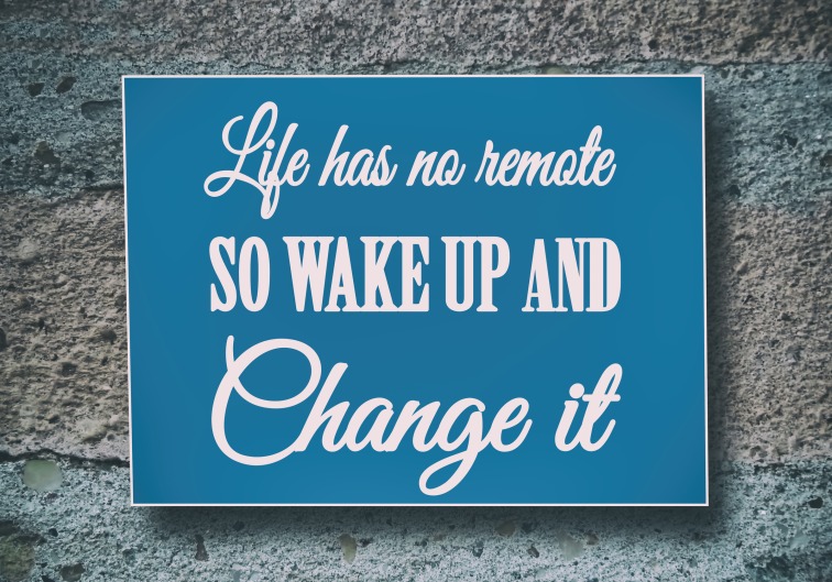 Life has no remote, so wake up and change it. Motivation, poster, quote, New Year quote, concrete background, blue paper